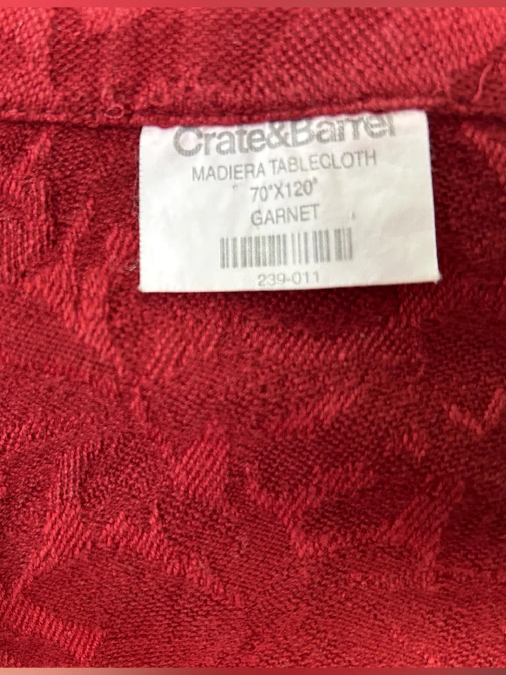 Crate&Barrel Madiera Tablecloth in Garnet Red, 70x120”. Jacquard pattern.